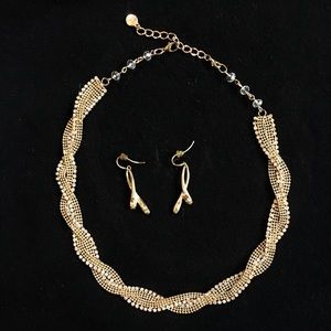 Gold and rhinestone necklace and earring set.